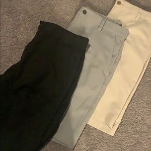3 pairs izod golf shorts. Black tan grey